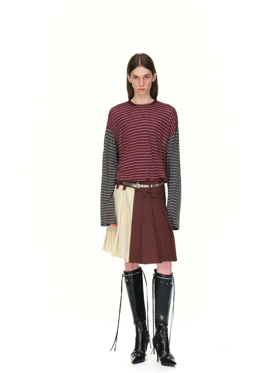 Mixed-Check Pleated Midi Skirt - model photograph