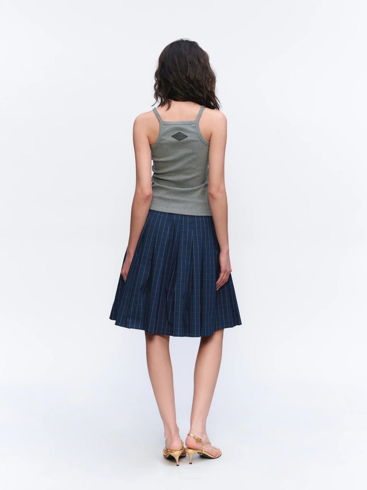 Asymmetric Checked Pleated Mini Skirt - model photograph 2