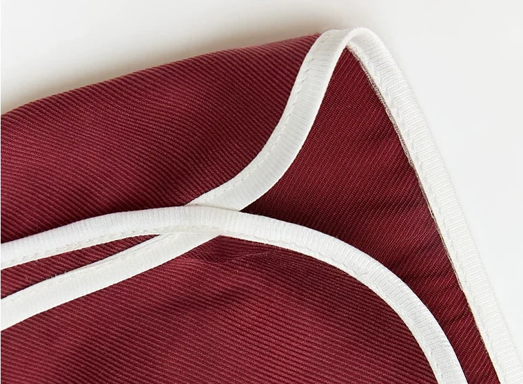 Embroidered Satin Sports Shorts - edge binding detail