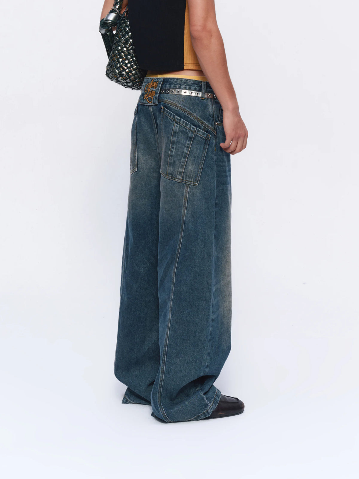 Vintage-Wash Wide-Leg Jeans — model photograph