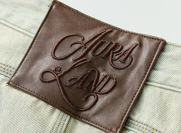 Vintage-Wash Wide-Leg Jeans - logo patch detail