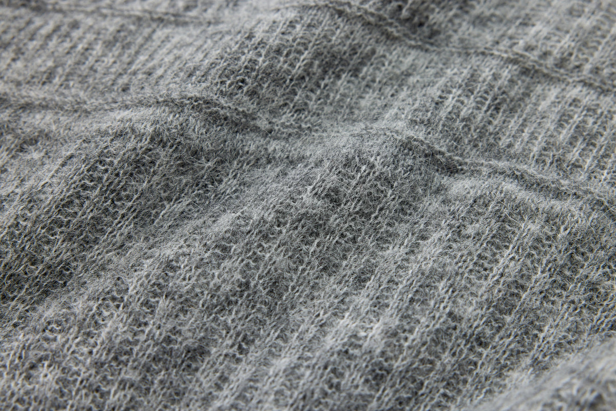 Striped Wool Polo Sweater — fabric or construction detail